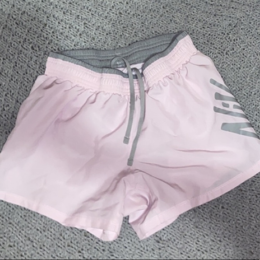 pink nike running shorts